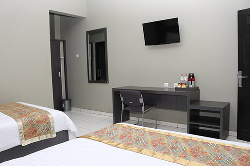 Deluxe Kamar hotel dengan fasilitas ber-AC di Pangandaran
